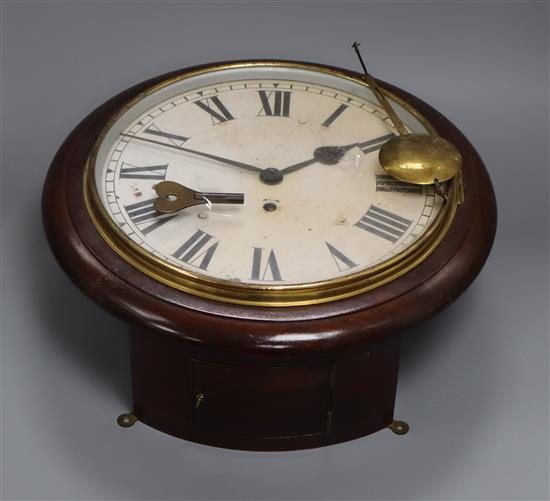 A mahogany circular wall clock